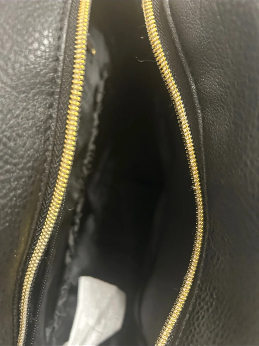 Nicole Miller Black Quilted Backpack with Gold Accents